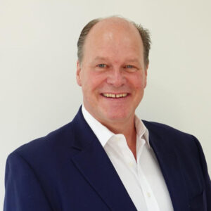 Head and shoulders photo of Ken Neal from the Groundswell Team
